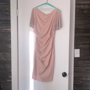 Blush colored short ruched crepe dress with beaded sleeves. Worn one time.